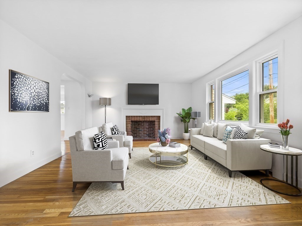 51 Albemarle Road Newton, MA 02460 - Photo 2 of 31 a living room with furniture and a fireplace