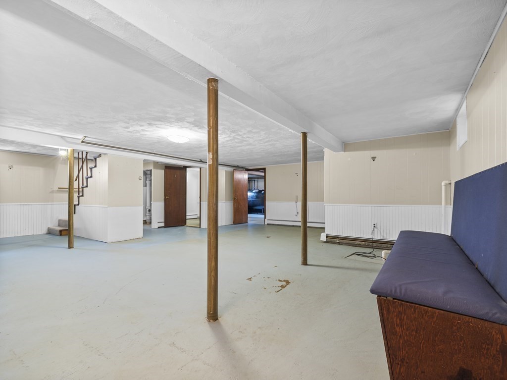 51 Albemarle Road Newton, MA 02460 - Photo 21 of 31 a view of a livingroom with furniture and a hallway