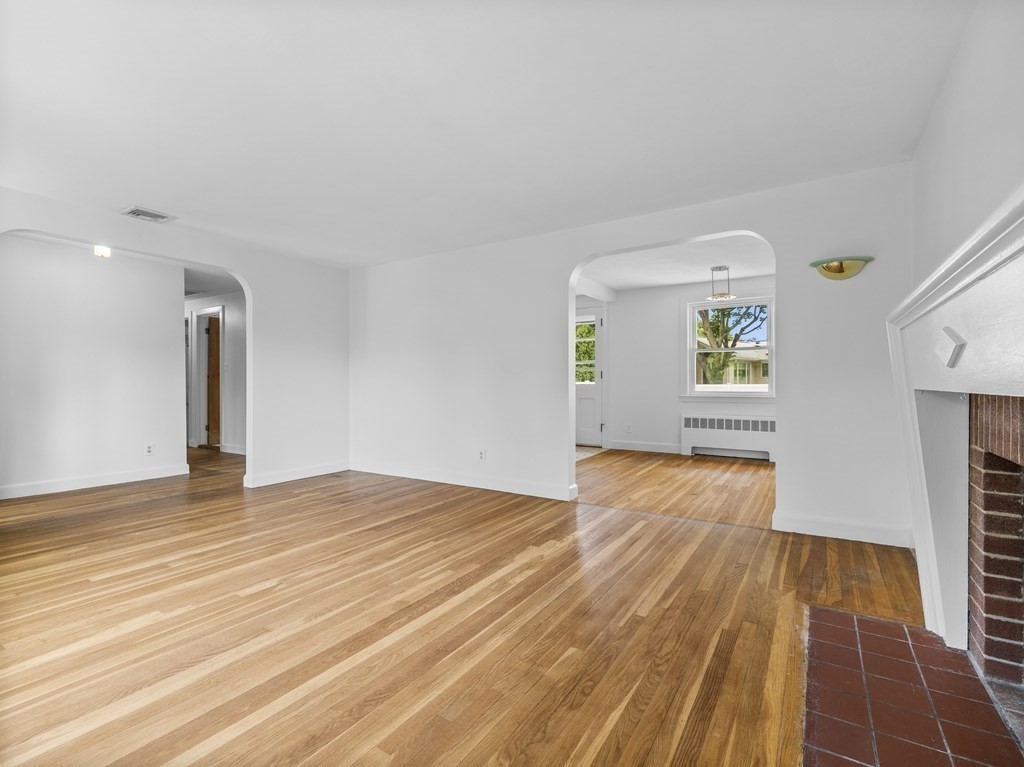 51 Albemarle Road Newton, MA 02460 - Photo 4 of 31 a view of empty room with wooden floor