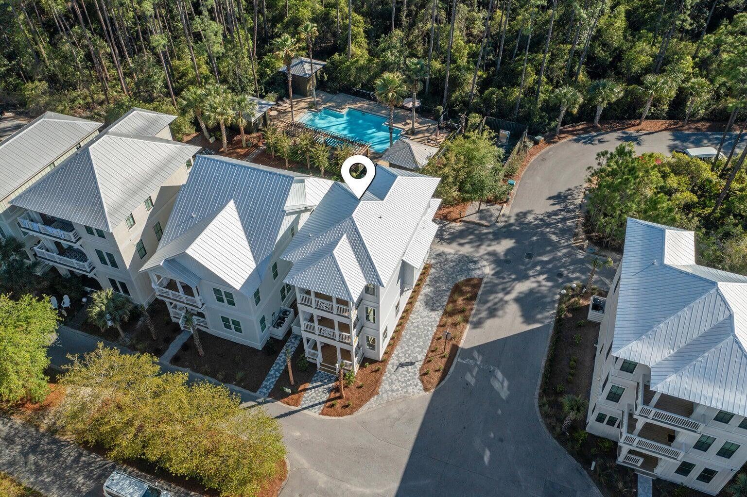 171 Redbud Ln Inlet Beach Inlet Beach, FL 32461 - Photo 1 of 38 an aerial view of a house with wooden floor