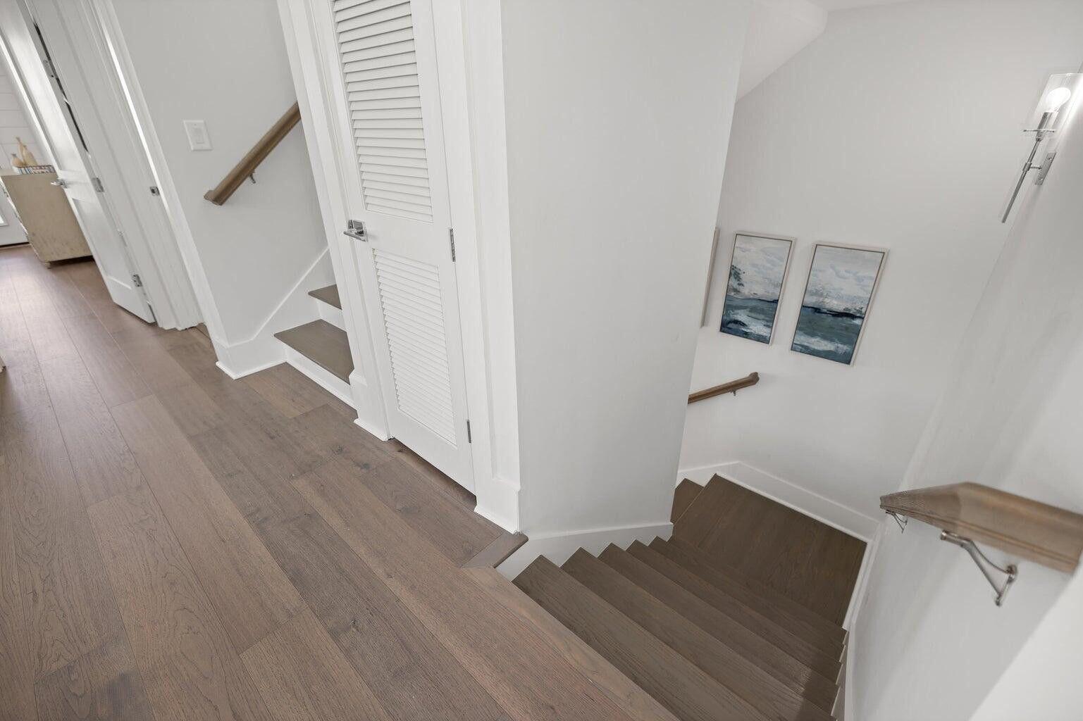 171 Redbud Ln Inlet Beach Inlet Beach, FL 32461 - Photo 12 of 38 a view of a hallway with wooden floor and staircase