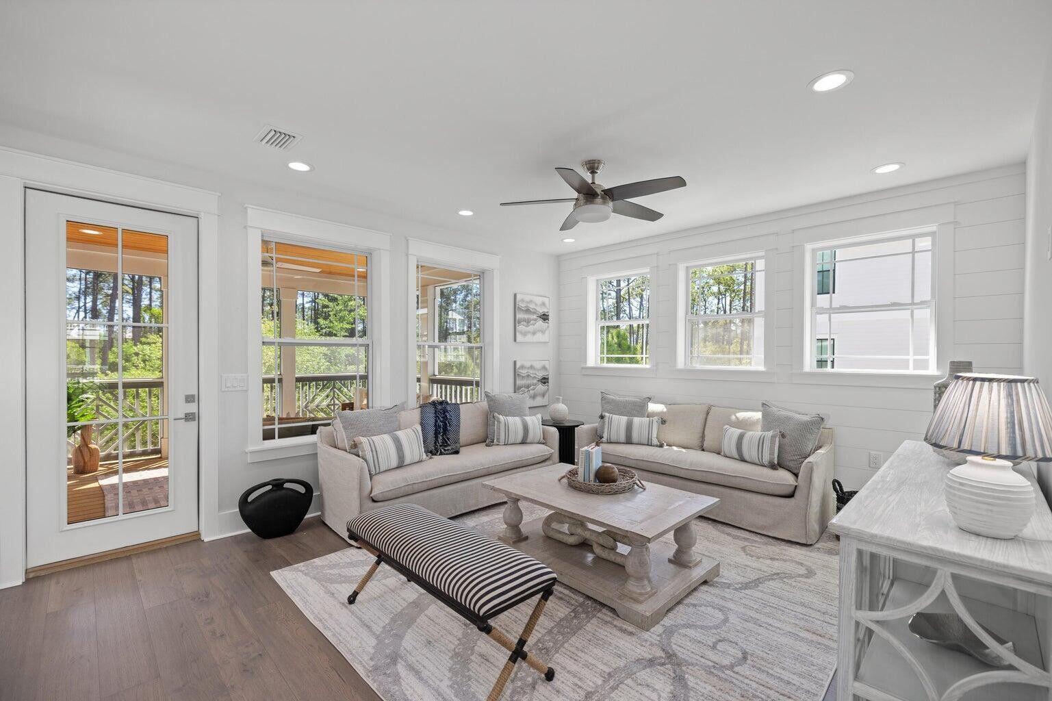 171 Redbud Ln Inlet Beach Inlet Beach, FL 32461 - Photo 13 of 38 a living room with furniture and a large window