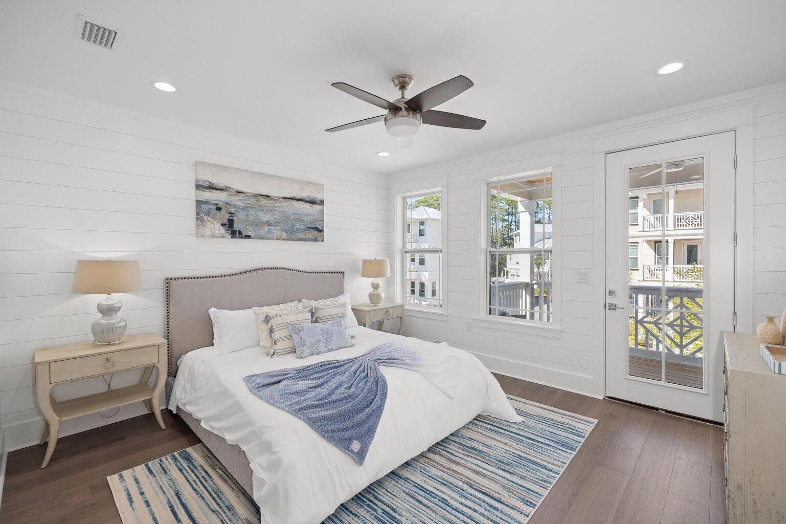 171 Redbud Ln Inlet Beach Inlet Beach, FL 32461 - Photo 17 of 38 a bedroom with a large bed and a window