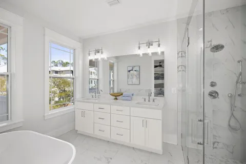 a view of a two chairs in the balcony