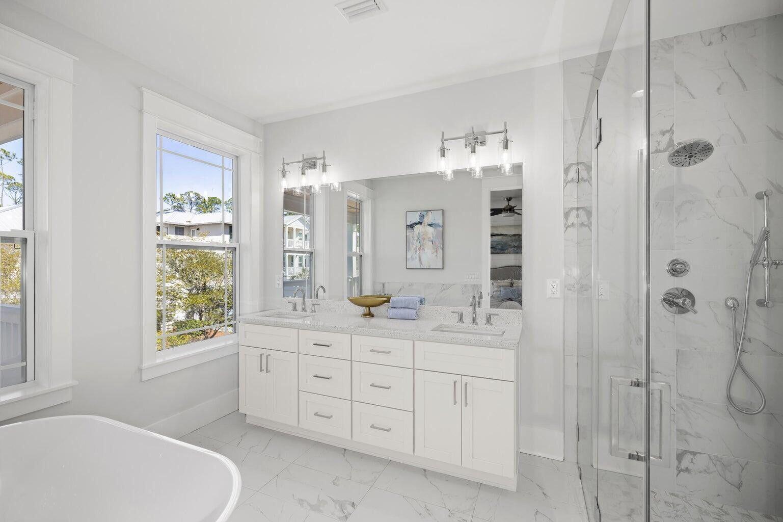 171 Redbud Ln Inlet Beach Inlet Beach, FL 32461 - Photo 18 of 38 a bathroom with a double vanity sink a toilet a window and shower