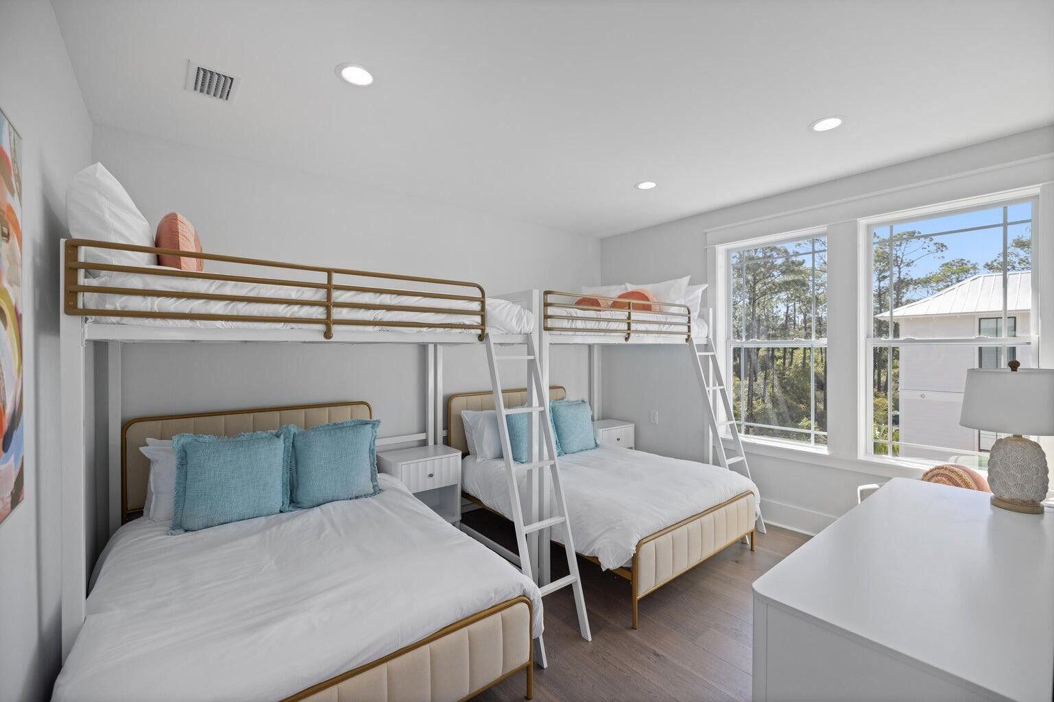 171 Redbud Ln Inlet Beach Inlet Beach, FL 32461 - Photo 24 of 38 a bedroom with a bed and large windows