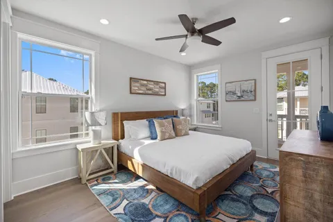 a bathroom with a granite countertop sink toilet a bathtub and a shower
