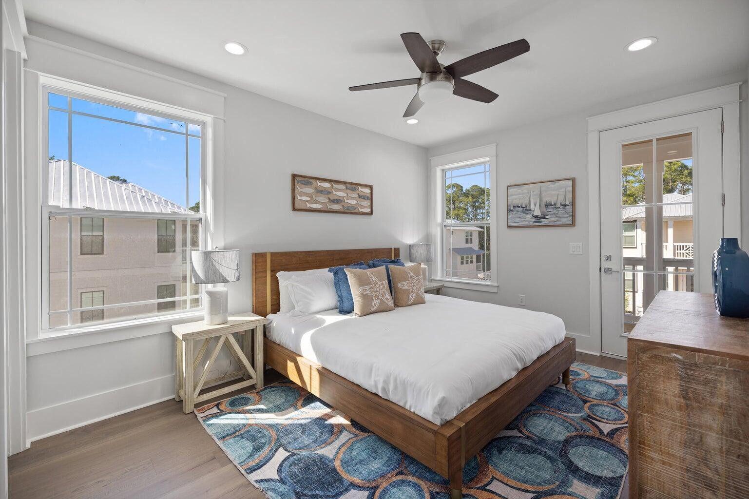 171 Redbud Ln Inlet Beach Inlet Beach, FL 32461 - Photo 26 of 38 a bed sitting in a bedroom next to a window