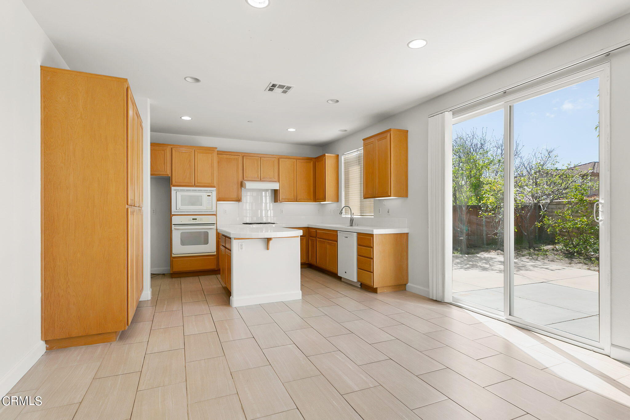 957 Entrada Drive Oxnard, CA 93030 - Photo 14 of 36 957 Entrada dining room and kitchen