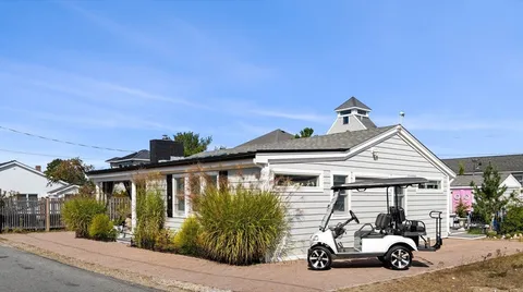 a car parked in front of a house