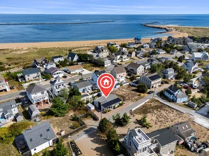 an aerial view of a parking space with city view