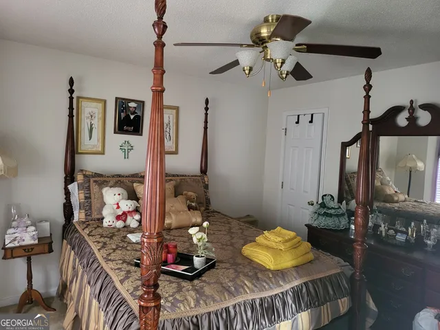 a bathroom with sink mirror and window