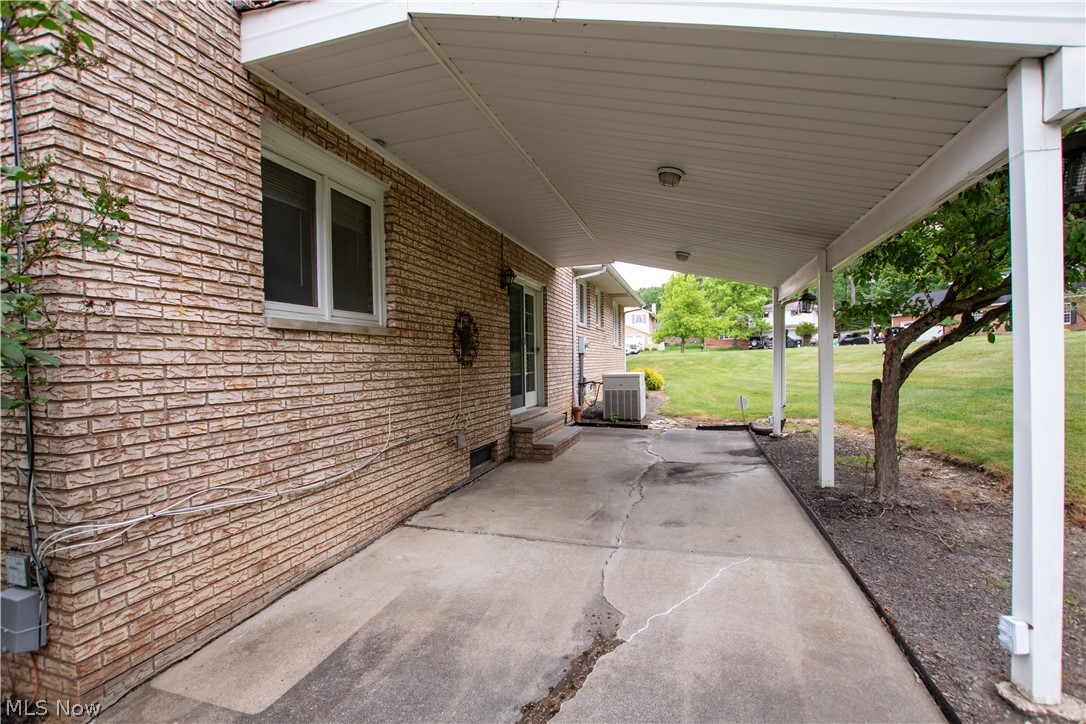 6013 Rousseau Drive Parma, OH 44129 - Photo 40 of 50 View of terrace featuring central AC unit