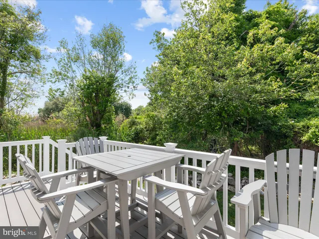 a view of a patio in backyard