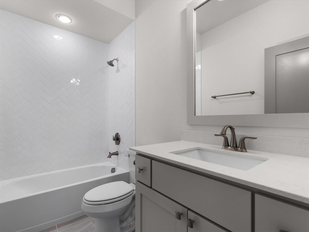 7104 Prairie Ridge Road Argyle, TX 76226 - Photo 35 of 39 Full bath with shower / bathtub combination and vanity