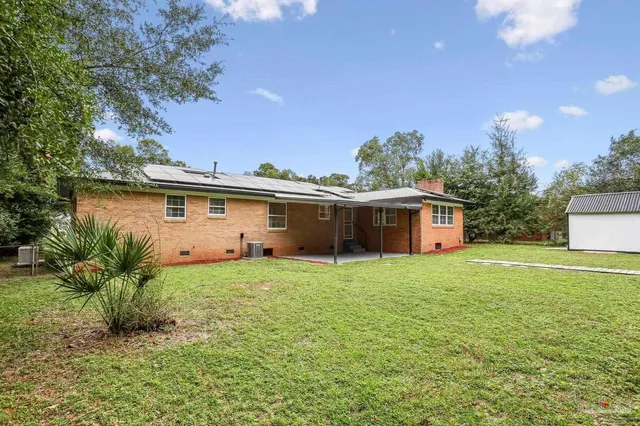 a house view with a outdoor space
