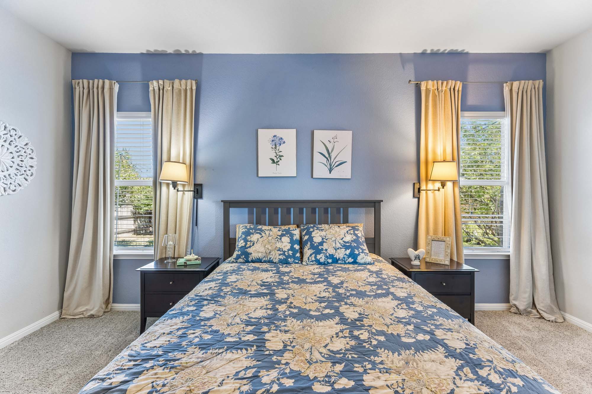 124 Moravia Road Georgetown, TX 78626 - Photo 11 of 38 Natural light streams through dual windows to illuminate this cozy bedroom retreat.