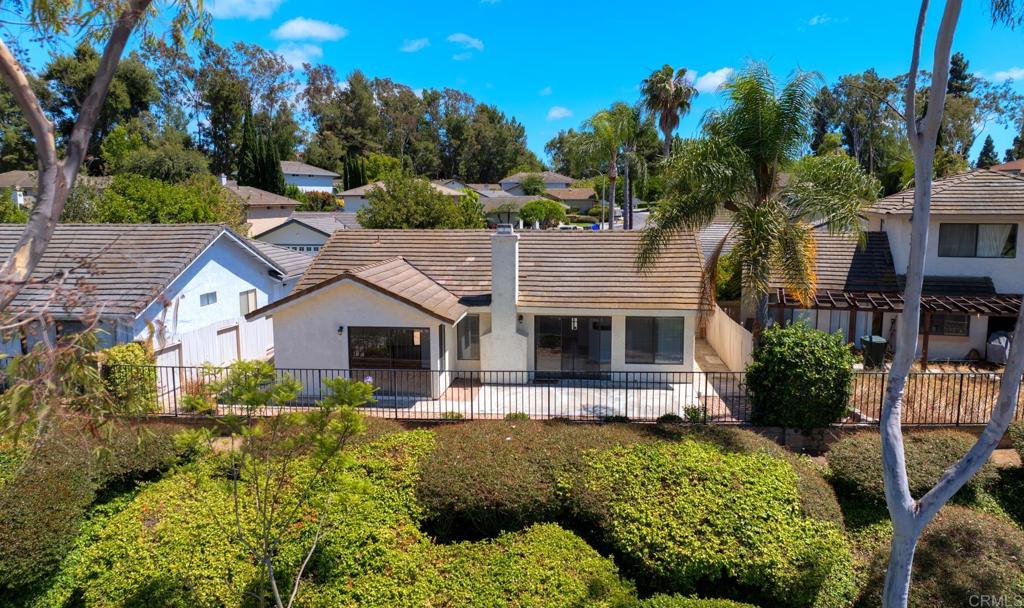 1394 Longfellow Road Vista, CA 92081 - Photo 31 of 50 a front view of a house with a yard