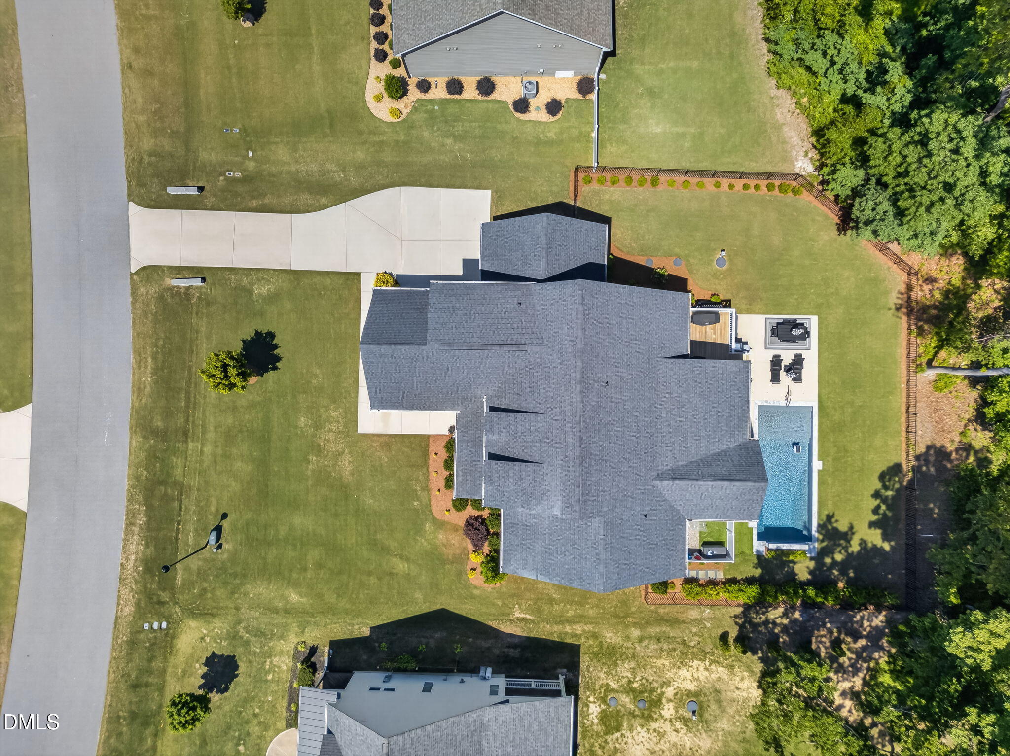 203 Freewill Place Raleigh, NC 27603 - Photo 58 of 62 58-web-or-mls-DJI_20260513022306_0083_D