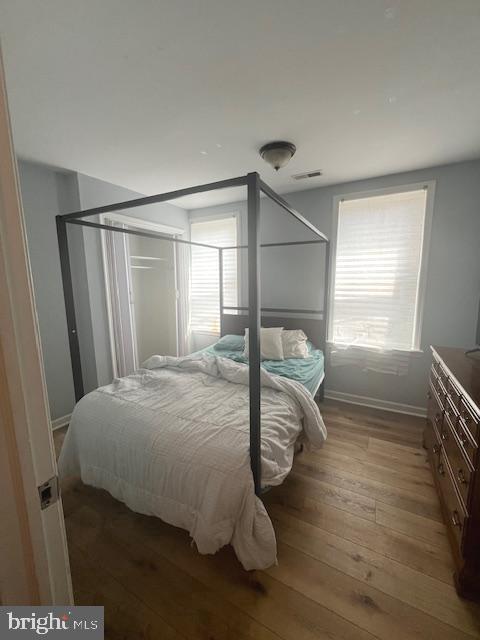 2546 North 7th Street, Unit 2 Philadelphia, PA 19133 - Photo 8 of 11 a bedroom with a bed and a window