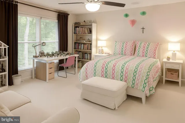 a bedroom with a bed and a couch