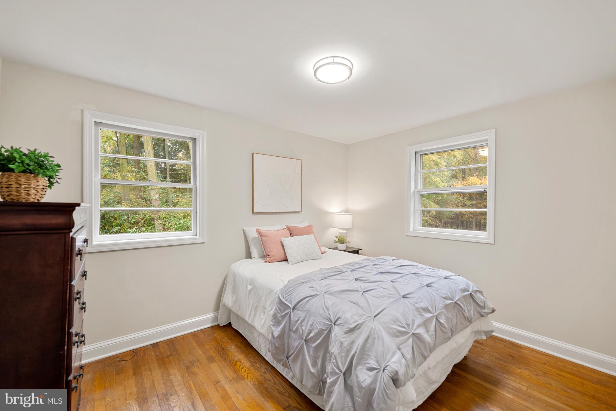 7807 Colonial Lane Clinton, MD 20735 - Photo 15 of 29 a bedroom with a bed and a window
