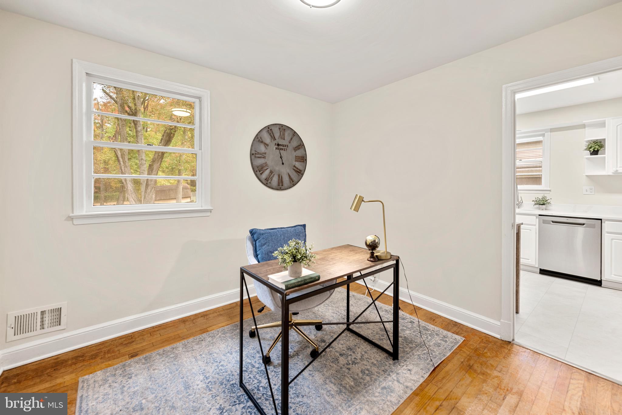 7807 Colonial Lane Clinton, MD 20735 - Photo 16 of 29 a view of a workspace with furniture and a window