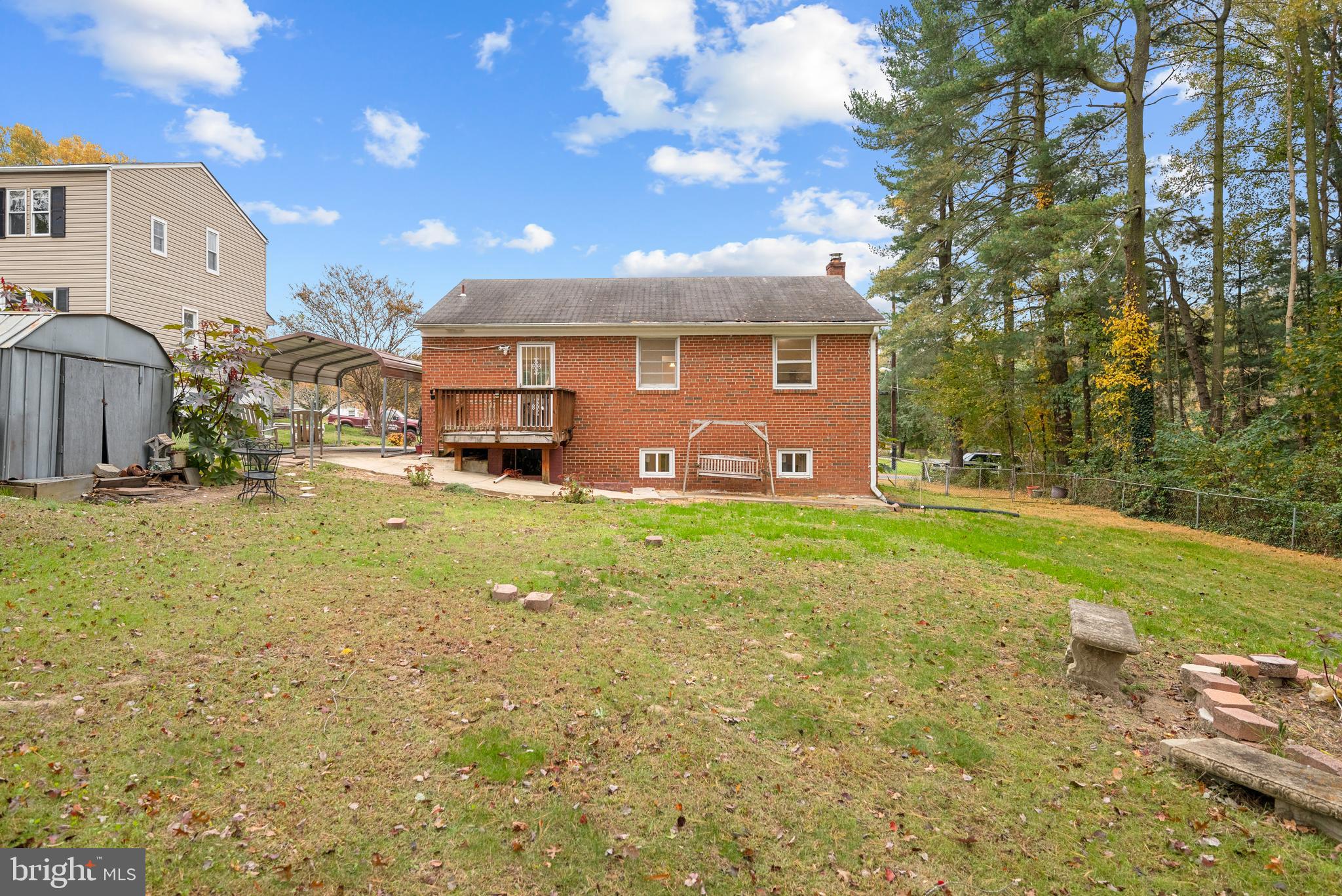 7807 Colonial Lane Clinton, MD 20735 - Photo 24 of 29 a front view of a house with garden