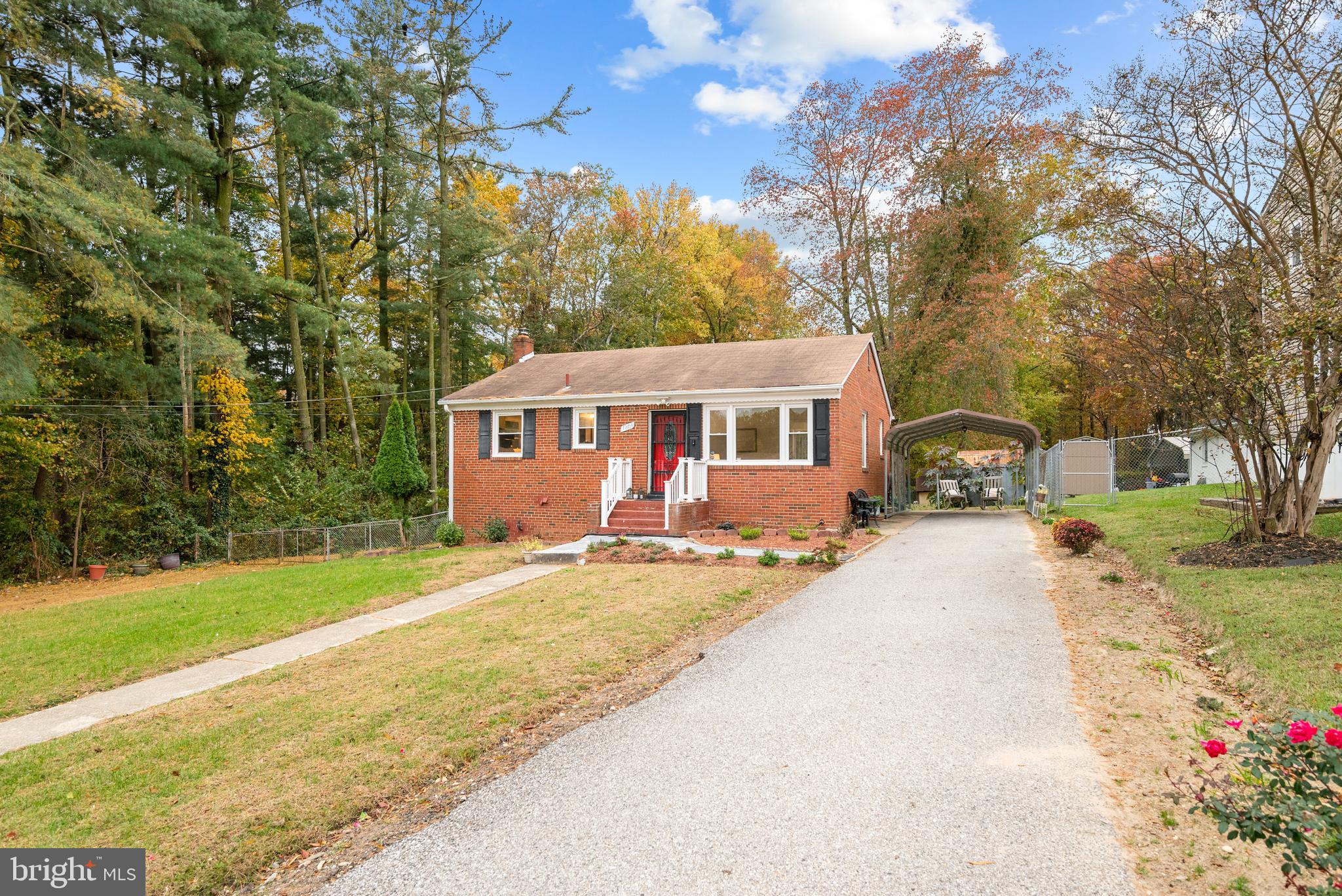 7807 Colonial Lane Clinton, MD 20735 - Photo 25 of 29 a view of a house with backyard and sitting area