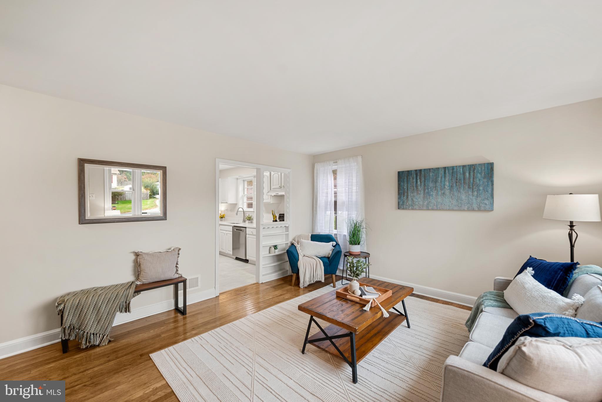 7807 Colonial Lane Clinton, MD 20735 - Photo 3 of 29 a living room with furniture rug and wooden floor