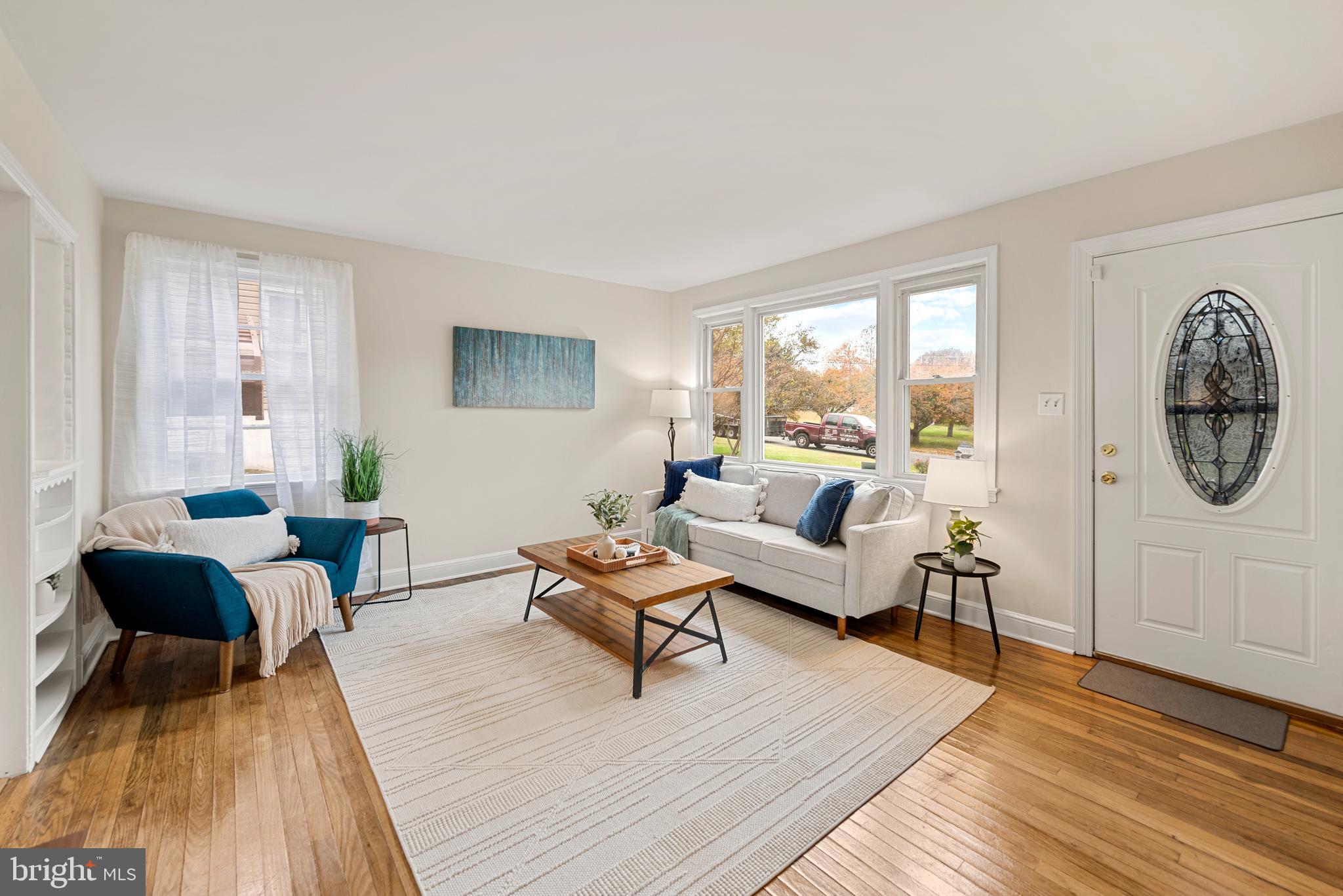 7807 Colonial Lane Clinton, MD 20735 - Photo 10 of 29 a living room with furniture and a large window