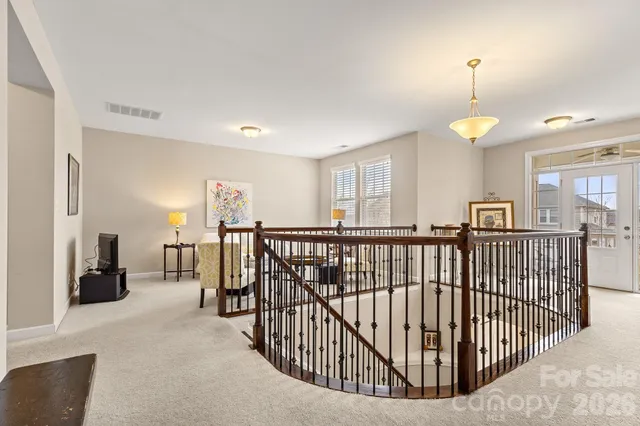 a view of a hallway with workspace