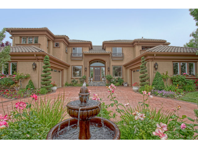 a house view with a garden space