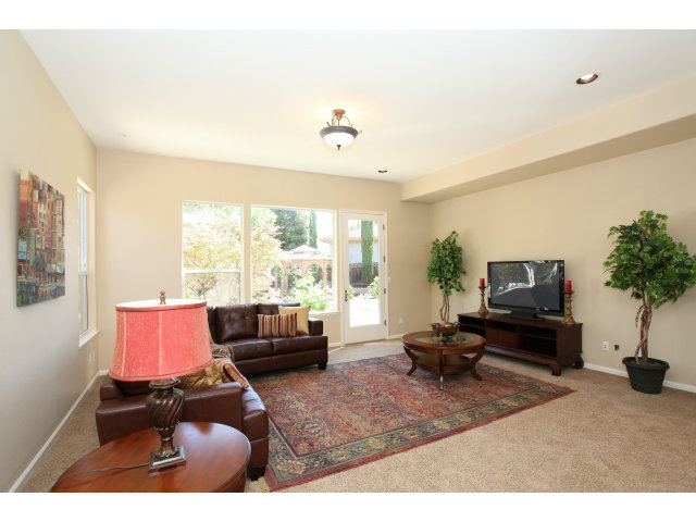 5504 Perugia Circle San Jose, CA 95138 - Photo 11 of 25 a living room with furniture and a flat screen tv