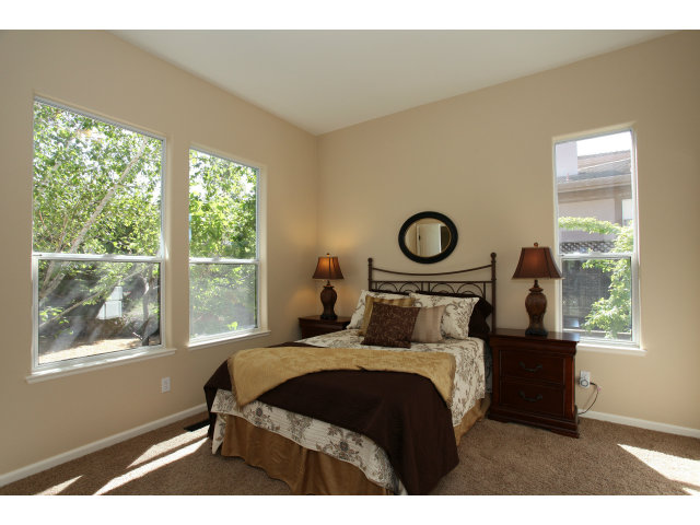 5504 Perugia Circle San Jose, CA 95138 - Photo 14 of 25 a bedroom with a bed and a window