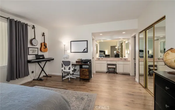 a view of a livingroom with furniture and a flat screen tv