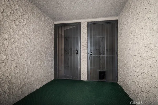 a view of a livingroom with a hallway