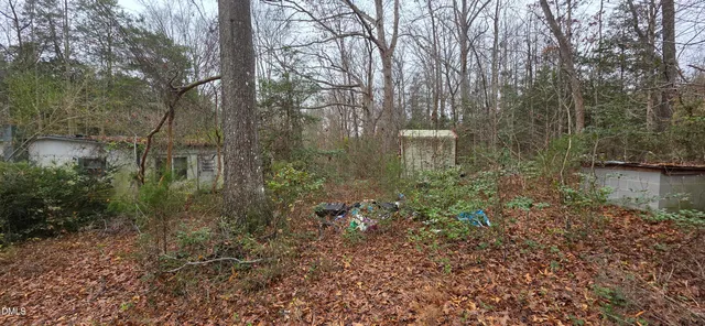 a view of a lake with lots of green space