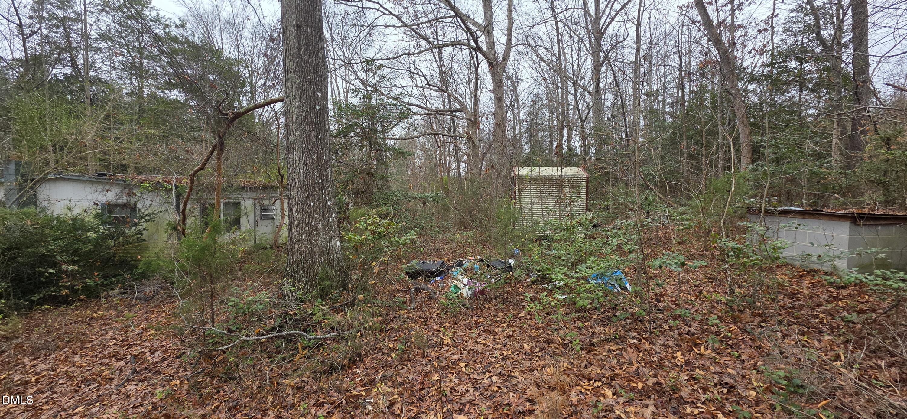 674 Axtell Ridgeway Road Norlina, NC 27563 - Photo 5 of 7 a view of a lake with lots of green space