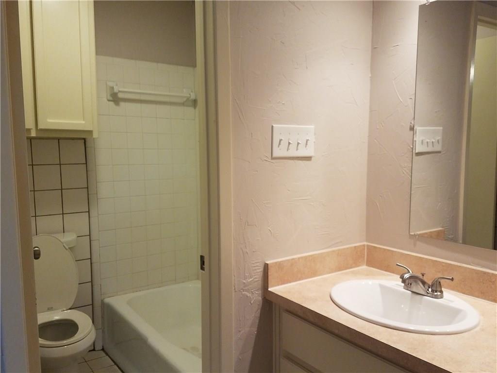 6919 West Cleburne Road Fort Worth, TX 76133 - Photo 8 of 15 Bathroom