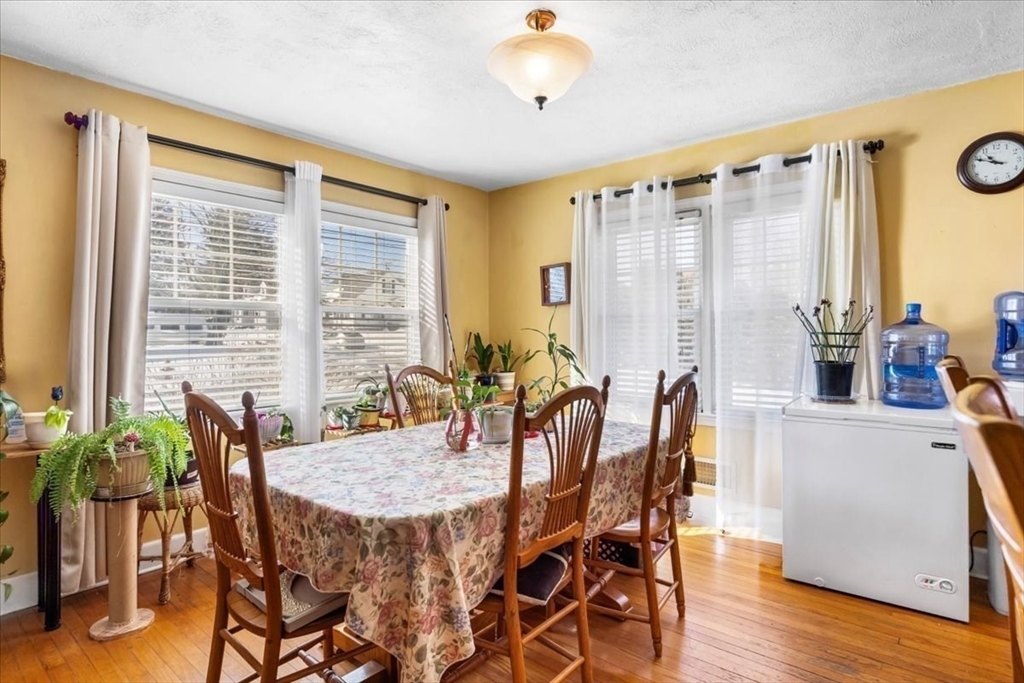 210 Harrison Avenue Somerset, MA 02726 - Photo 14 of 29 a view of a dining room with furniture and wooden floor
