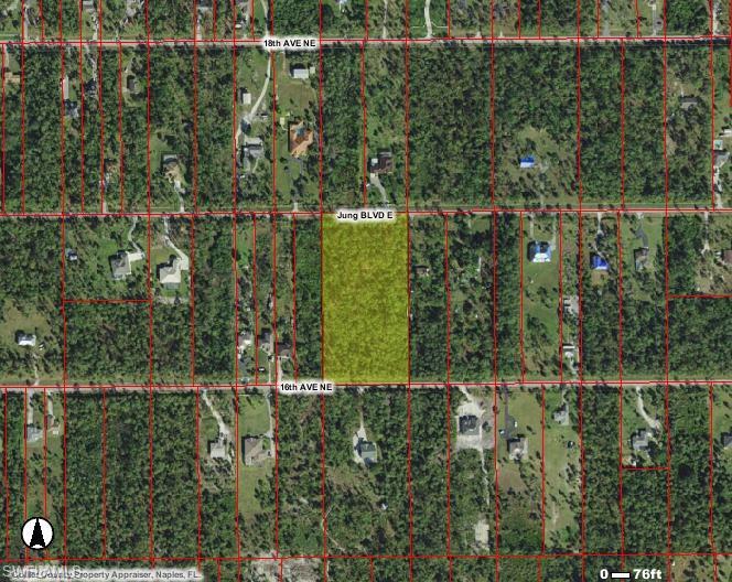 Jung Boulevard Naples, FL 34120 - Photo 15 of 20 a view of a green yard