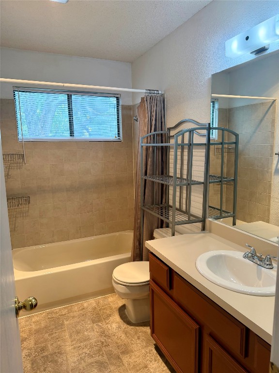 1707 Honeysuckle Lane Round Rock, TX 78664 - Photo 19 of 21 a bathroom with a sink a toilet and shower