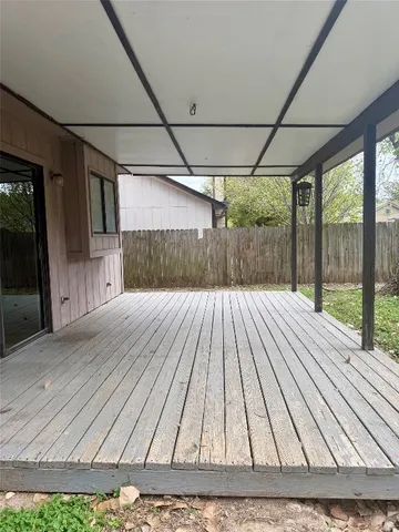 a view of backyard with wooden floor
