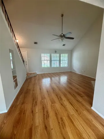 a view of an empty room and window