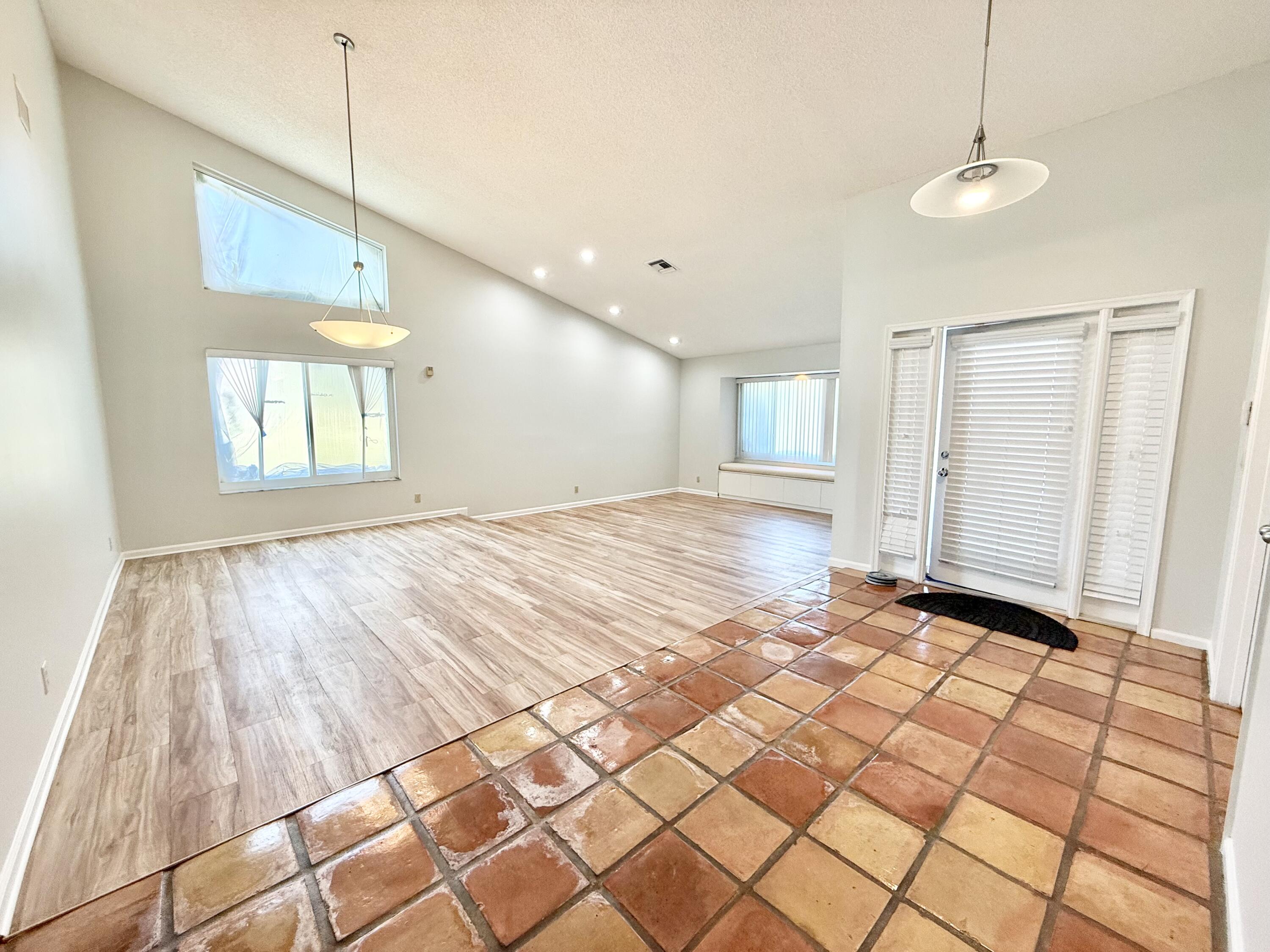 11933 Waterwood Drive Boca Raton, FL 33428 - Photo 27 of 51 LIVING ROOM + DINING ROOM