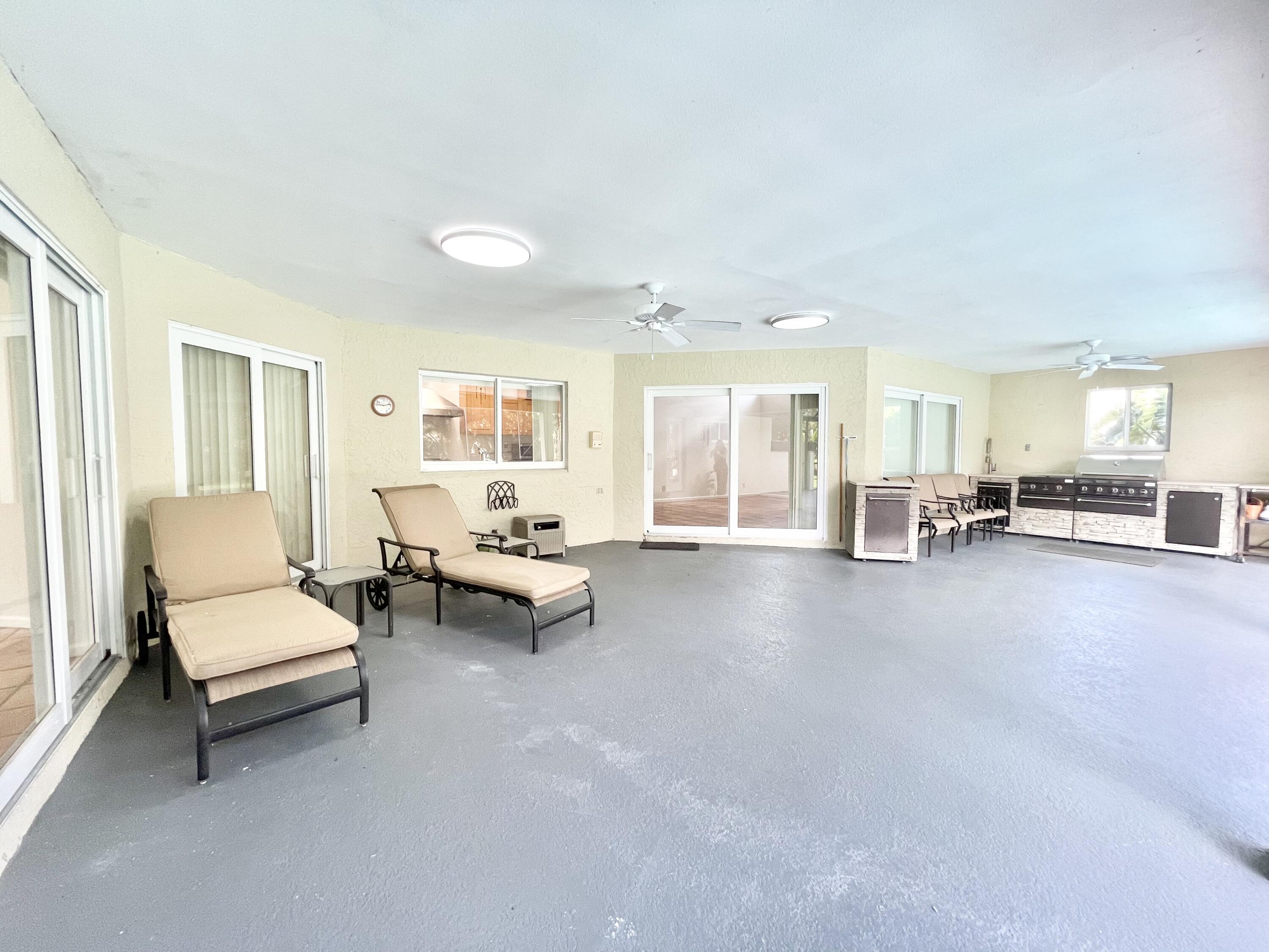 11933 Waterwood Drive Boca Raton, FL 33428 - Photo 31 of 51 Large Covered Patio