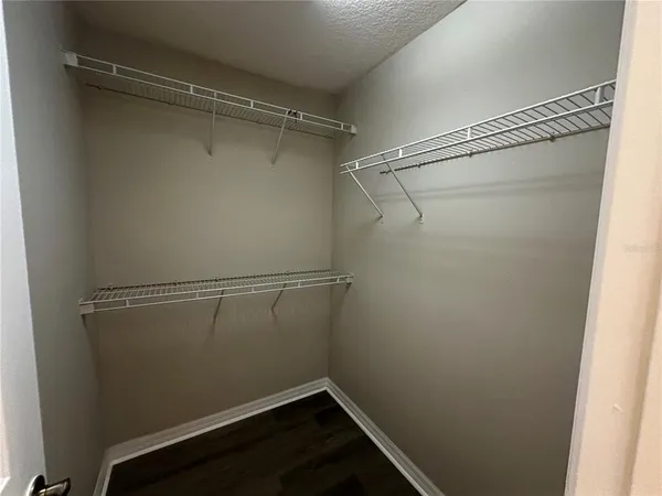 a view of a room with racks on the wall