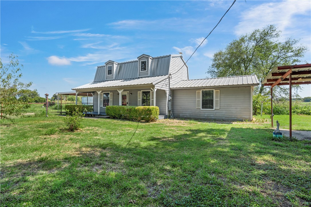 821 Old Country Road Moody, TX 76557 - Photo 2 of 21 a view of a house with backyard and garden