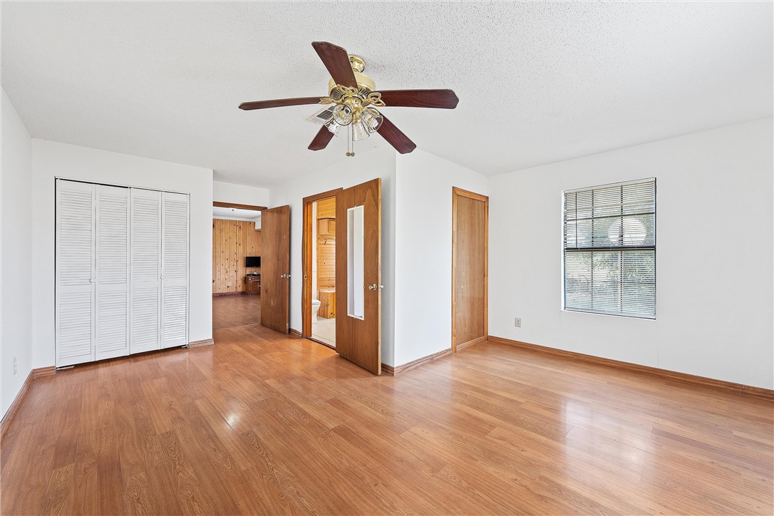 821 Old Country Road Moody, TX 76557 - Photo 7 of 21 a view of empty room with wooden floor and window